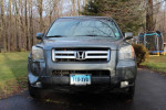 Front view of a 2007 Honda Pilot EX-L in good condition showcasing its exterior and features.