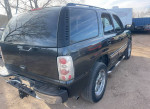 2004 GMC Yukon with 89k miles, clean title, leather interior, dual airbags, and 20-inch rims.