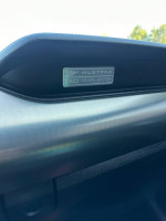 Interior view of the 50th Anniversary Mustang GT badge on the dashboard.