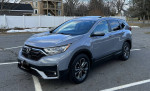2021 Honda CRV EX with 19K miles, AWD, sunroof, and heated seats parked on the street.