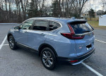 2021 Honda CR-V EX in gray, showcasing clean exterior, all-wheel drive, with sunroof and LED lights.