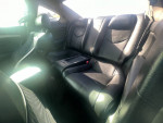 Interior view of a 2008 Infiniti EX with black leather seats and modern design.