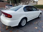 2004 Subaru Legacy sedan, 129,000 miles, clean title, parked in Hayward with new oil change and registration.