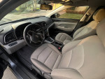 Interior view of a 2017 Hyundai Elantra Eco showing clean seats and dashboard features.