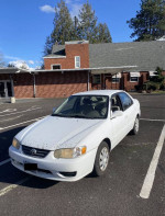 2001 Toyota Corolla CE Sedan parked with visible exterior details and surroundings.