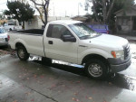 2011 Ford F-150 XL 4WD pickup truck in white, showcasing good condition and no significant damage.
