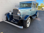 1930 Plymouth sedan hot rod with a sleek design, showcasing new wheels and an inviting interior.