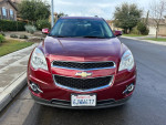 Front view of a 2010 Chevrolet Equinox in great condition with alloy wheels and clean title.