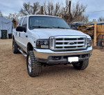 2000 Ford F250 Super Duty 4x4 truck with 267,000 miles, clean title, upgraded features, and heavy-duty tires.
