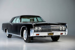 1963 Lincoln Sedan in pristine condition, fully restored with original parts, showcasing classic elegance.