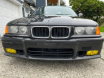 Front view of a 1995 Dinan Supercharged BMW M3 with excellent condition and no accidents