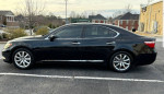 2008 Lexus LS 460 RWD in black, showcasing sleek design with heated leather seats and strong performance.