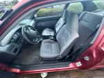 Interior view of 1997 Toyota Tercel showing seating and dashboard features.