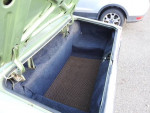 Interior view of the trunk of a 1971 Ford Thunderbird showing clean carpet and ample space.
