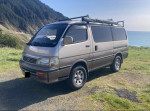 1994 Toyota Hiace SuperCustom van for sale, features include 4WD and new all-terrain tires.