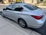 2014 Infiniti Q50 Premium sedan for sale, silver, features blind spot monitors and heated seats.
