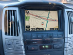 Interior view of 2007 Lexus RX400h hybrid dashboard with GPS navigation display