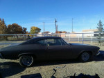 1968 Chevrolet Chevelle project car with 350 V-8 engine, original glass, and few surface rust spots.