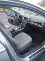 Interior of 2016 Ford Fusion S FWD showing seats, dashboard, and infotainment system