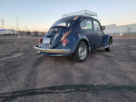 1970 VW Beetle with unique patina and new seats from a 2015 Kia Soul, available for sale.
