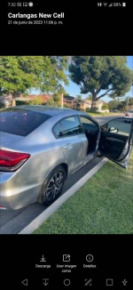 2015 Honda Civic SE FWD with sunroof and reverse camera parked with open door, showcasing clean interior.