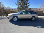 2008 Subaru Outback in good condition, showcasing all-wheel drive and excellent gas mileage.