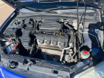 2003 Honda Civic engine compartment with good condition components and new Goodyear tires