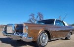 1970 Lincoln Continental Mark III with a rebuilt 460 V8 engine parked under a clear blue sky