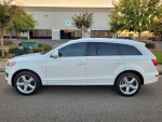 2009 Audi Q7 S-Line Premium Plus SUV in excellent condition, showcasing its sleek design and spacious side view.