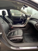 Interior view of 2014 Chevrolet Malibu LTZ with leather seats and touchscreen display