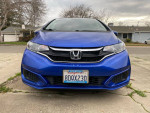 Front view of a clean 2018 Honda Fit in blue color with California license plate