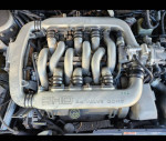 Yamaha-built 3.0L V6 engine with 24 valves in a 1992 Ford Taurus SHO.