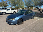 2008 Subaru Impreza WRX in blue, parked with power features, needs repairs, clean title, low mileage.