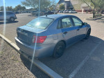 2008 Subaru Impreza WRX AWD parked with clear sky, showing body and wheel details.