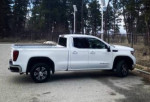 2022 GMC 1500 Sierra 4x4 extended cab truck with roof rack, white color, V8 engine, heated seats, fully loaded.
