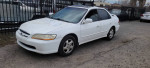 2000 Honda Accord EX FWD with 74,000 miles, parked in a lot, clean title and registered until August 2024.