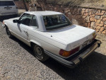 1979 Mercedes-Benz 450SL parked on gravel, showing original condition and maintenance updates.