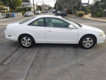 2000 Honda Accord EX-L in perfect condition, white with cream leather interior, parked on a residential street.