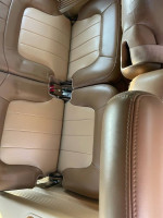 Interior view of the 2002 GMC Envoy seating with leather upholstery, showcasing space for seven passengers.