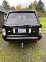Rear view of a 2006 Land Rover Range Rover, showcasing its sleek design and new features.