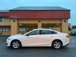 2020 Chevrolet Malibu LS FWD parked outside, showing clean design and excellent condition with low mileage.