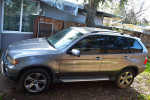 2006 BMW X5 AWD SUV in good condition with low mileage, featuring a powerful V8 engine and premium interior.