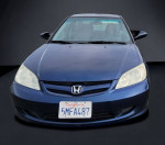 Front view of a 2005 Honda Civic GX in blue, showing clean body and headlights.