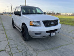 2003 Ford Expedition XLT FX4 4WD in white, showcasing front view and wheels, priced at $4,000 with 85,000 miles.