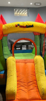 Bounceland Castle Bounce House with Hoop and Slide
